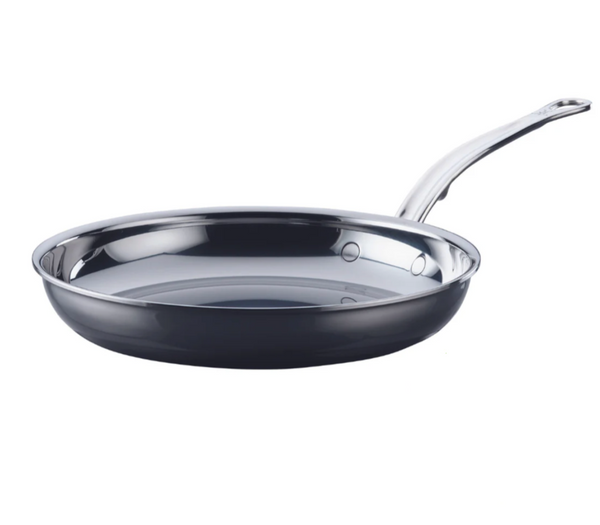 The Hestan NanoBond Titanium Skillet, 12.5", provides exceptional heat conductivity with its polished surface and curved handle, making it metal utensil safe and perfect for cooking needs, shown isolated on a white background.