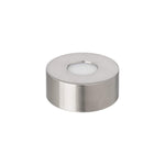The Simon Pearce Illumination Base, a round silver metal tealight holder with a white candle inside, sits on a plain white background—ideal for pairing with LED lighting to highlight its elegant simplicity.