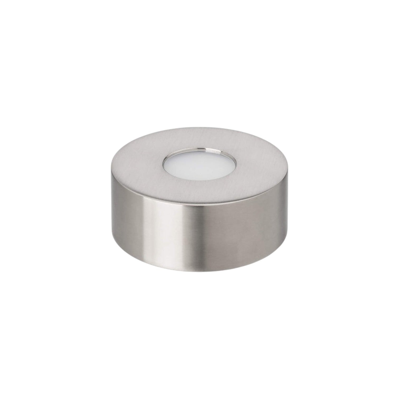 The Simon Pearce Illumination Base, a round silver metal tealight holder with a white candle inside, sits on a plain white background—ideal for pairing with LED lighting to highlight its elegant simplicity.