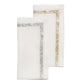 The Kim Seybert Impression Napkin Set includes two neatly folded white linen napkins—one with a silver embroidered border and one with a gold decorative border.