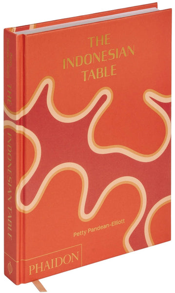 An orange hardcover book titled "Phaidon The Indonesian Table" by Petty Pandean-Elliott.