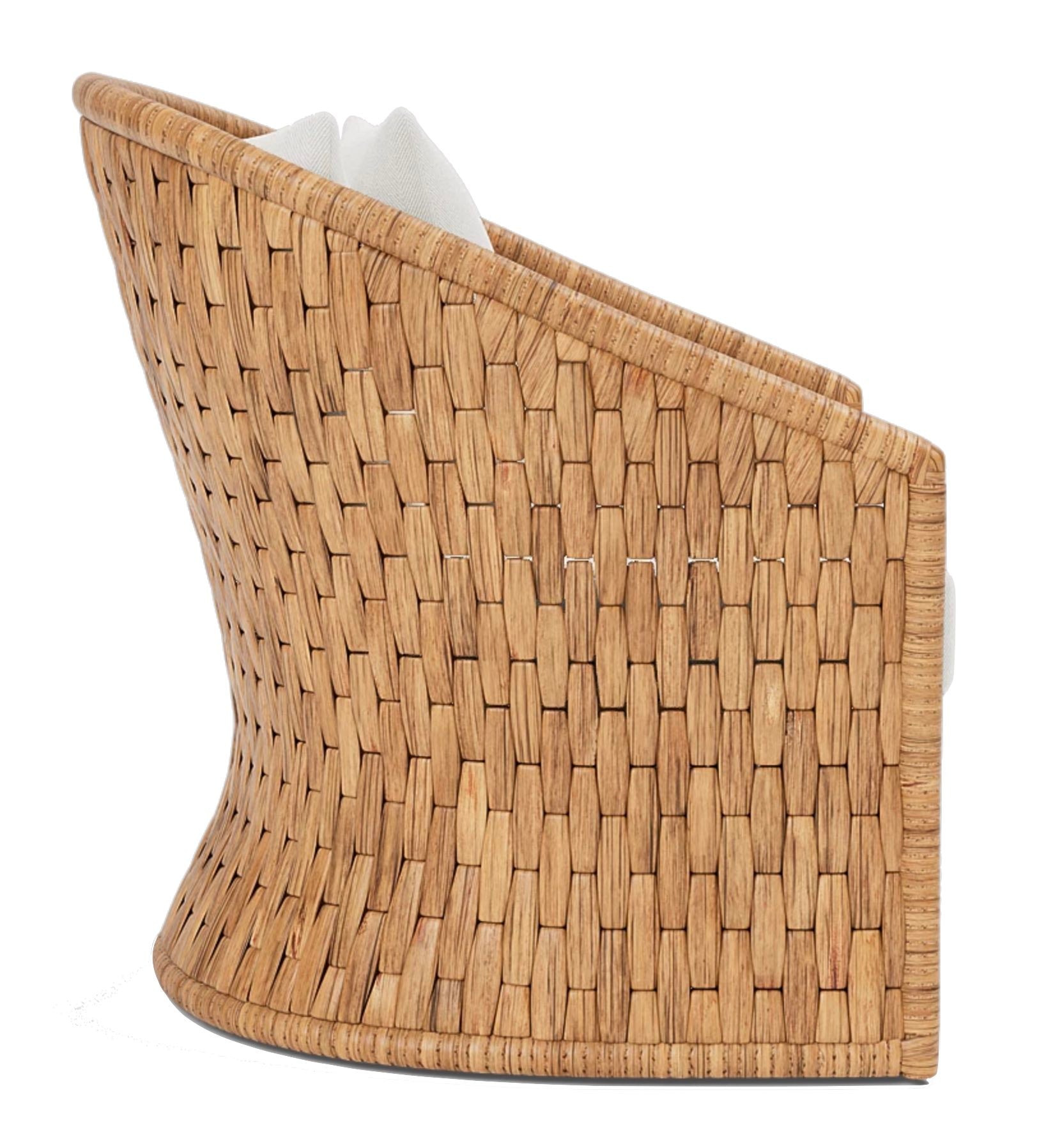 Side view of the Indra Lounge Chair by Made Goods, featuring a modern curved design, woven pattern, and light-colored cushion.