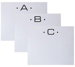 The Black Initial Large Notepad by Black Ink features three white cards labeled A, B, and C with black dots flanking each letter, crafted from quality paper and arranged in a stylish, overlapping staggered layout.