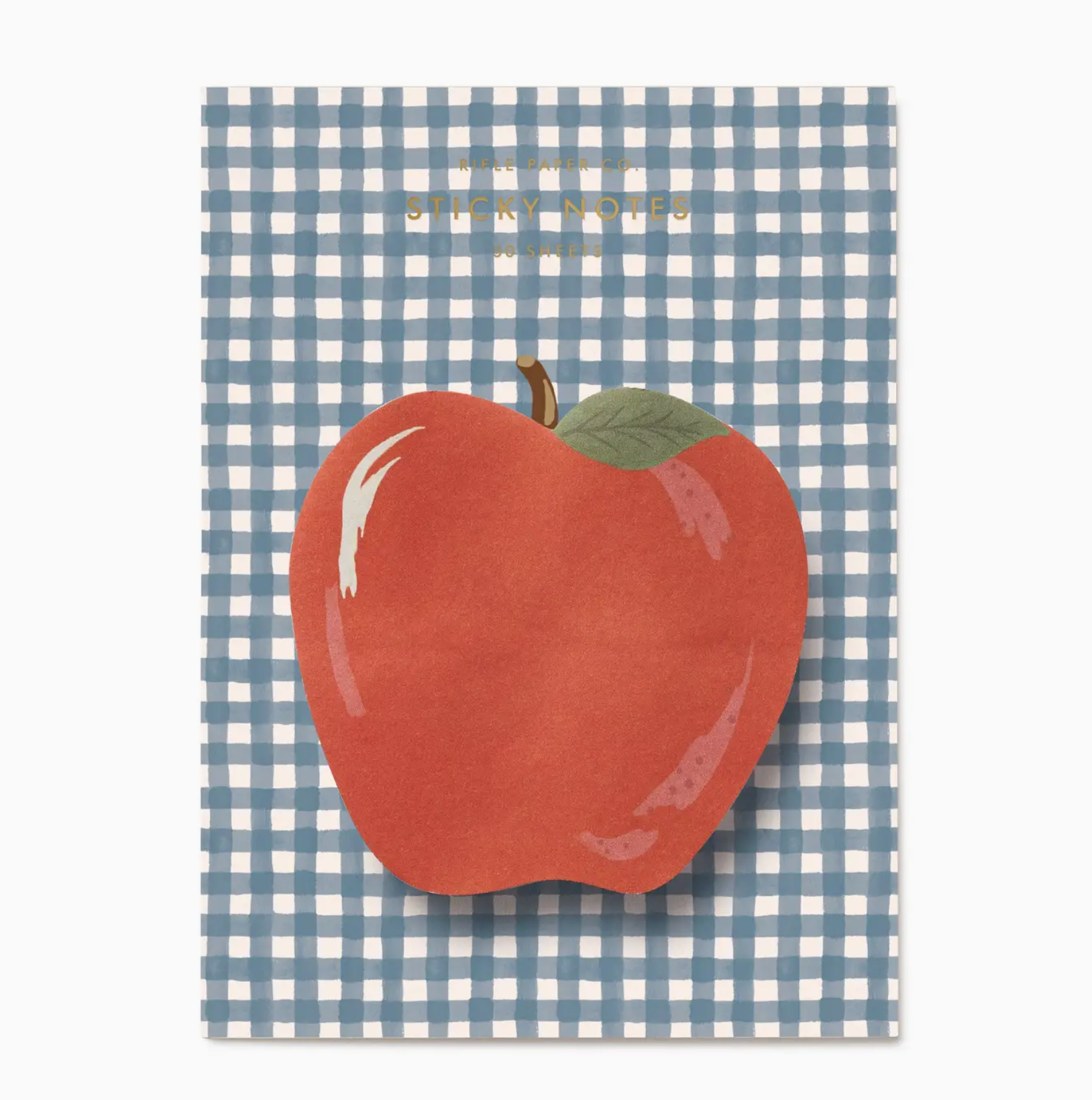 A notepad from the Rifle Paper Co. Schoolhouse Collection featuring an apple-shaped sticky note on a blue and white checkered background—perfect for desk supplies or thoughtful teacher gifts.