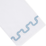 Haute Home Waverly Bath Accessories premium Italian linen hand towel in white with a blue embroidered wavy line pattern near the edge.