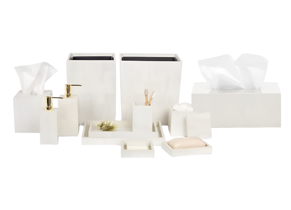 The Arles Bath Collection by Pigeon & Poodle—featuring white faux horn accessories like a tissue box, soap dispenser, tray, toothbrush holder, and soap dish—beautifully arranged on a white background.