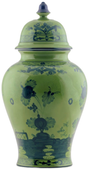 The Ginori 1735 Oriente Italiano Malachite Vase and Cover is a green ceramic piece adorned with dark blue floral and geometric designs.