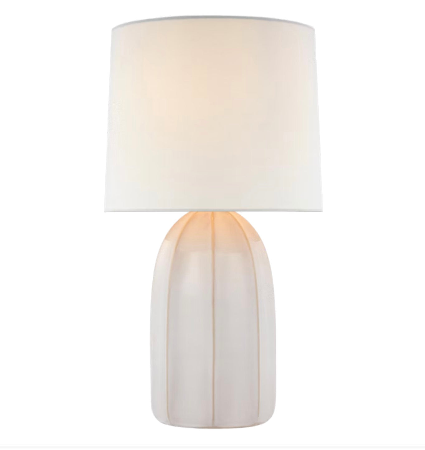 The Melanie Large Table Lamp Collection by Visual Comfort showcases a white, rounded base with reactive ceramic glazes and a cylindrical silk shade, beautifully photographed against a plain background.