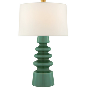 The Visual Comfort Andreas Medium Table Lamp in Aventurine features a glossy green ceramic base and a large white drum shade.