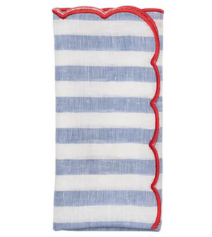 The Amalfi Napkin Set by Kim Seybert features folded linen napkins with blue and white horizontal stripes and a red scalloped trim on one side, inspired by Mediterranean style—perfect for bringing charm to your table.