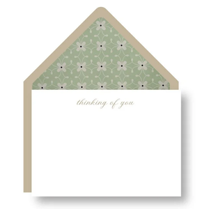 The Haute Papier Mint Thinking of You Note Set includes a blank card with "thinking of you" text and an open envelope lined with a green floral pattern.