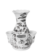 The Flint Grey Country Estate Tulipiere Vase by Juliska features a central neck with five smaller openings around the base, crafted in porcelain with grey landscape and nature illustrations in a floral aesthetic.