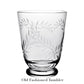 Old fashioned tumbler from the Jasmine Drinkware Collection by William Yeoward Crystal, shown on a white background. Features hand engraved leaf pattern for added elegance. "Old Fashioned Tumbler" text appears below the glass.