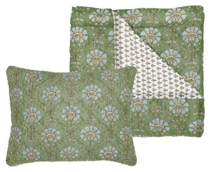 The Jeeva Sage Bedding Collection by John Robshaw features a hand-quilted sage green cotton voile quilt and pillow with a white floral pattern and a smaller repeating print on the reverse.