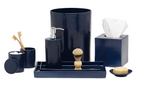 The Cordoba Navy Bath Collection by Pigeon & Poodle features hand-textured ceramic pieces—waste bin, tissue box, soap dispenser, toothbrush holder, lidded cup, shaving brush, tray, and soap dish with soap—displayed on a white background.