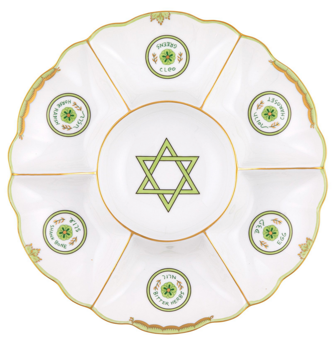 The Herend Seder Plate, Key Lime Green, is a ceramic Passover plate with six labeled sections, hand-painted designs, and a green Star of David in the center.