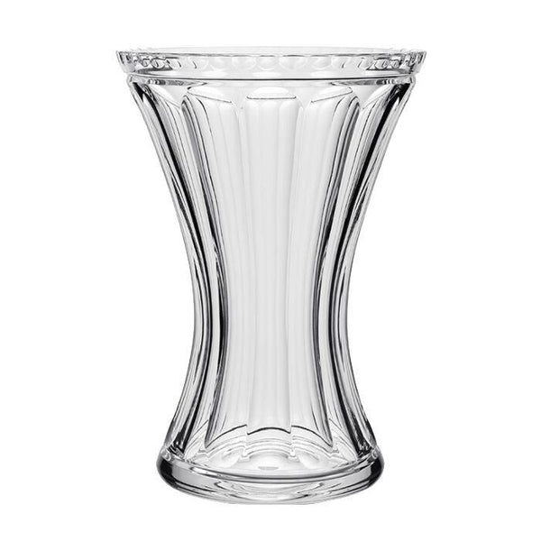 The William Yeoward Crystal Juliet Vase by William Yeoward Crystal, featuring a clear glass, fluted hourglass shape with vertical ridges, is perfect for elegant floral arrangements.