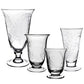 Four vases from the Jasmine Flower Vase Collection by William Yeoward Crystal, featuring handmade etched leaf designs inspired by a jasmine vine motif, are displayed in a row against a white background.
