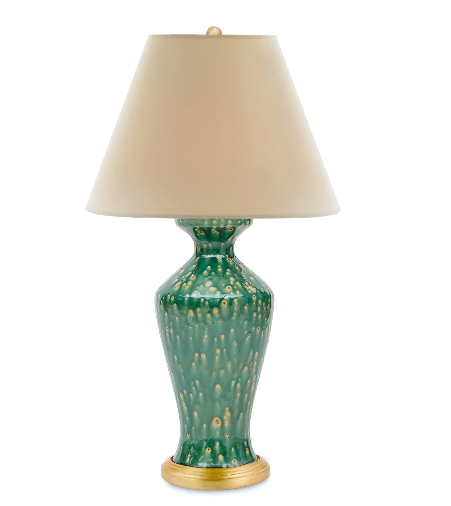 The Bunny Williams Lagoon Lamp features a green reactive glaze with gold accents, a beige lampshade, and an elegant gold-colored circular base.