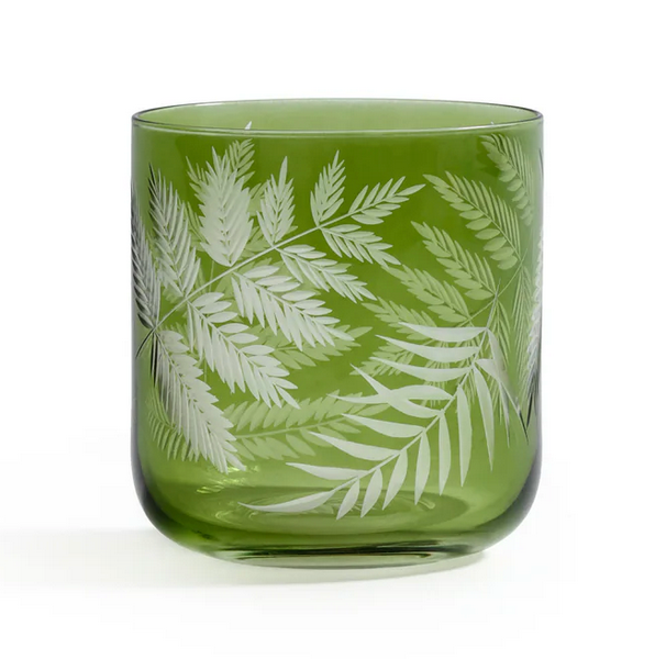 The Zodax Barware Fern Leaf Rock Glass features a delicate fern design in green glass, ideal for bringing nature-inspired elegance to your home bar.