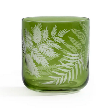 The Zodax Barware Fern Leaf Rock Glass features a delicate fern design in green glass, ideal for bringing nature-inspired elegance to your home bar.