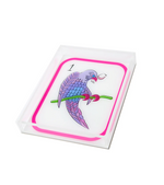 The Mahjong Birdie Bam Acrylic Tray by Tara Wilson Designs features a vibrant playing card with a purple and blue parrot perched on a green branch, accented by the number 1 in the top left corner. Encased in clear acrylic, it’s an eye-catching accessory for game night.
