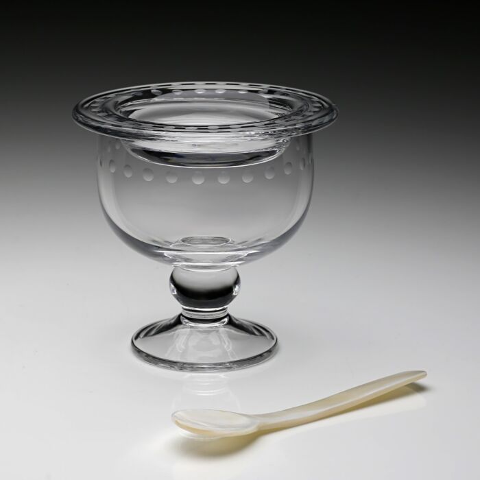 The William Yeoward Crystal Katerina Crystal Caviar Server for 2 features a dotted design, pedestal base, clear glass lid, and comes with a small white spoon—perfect for serving caviar in elegant style.