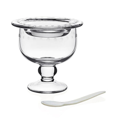 The William Yeoward Crystal Katerina Caviar Server for 2 features clear crystal with a wide rim and small pedestal base, paired with a white spoon, shown on a plain white background—perfect for stylish caviar presentation.