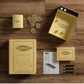A Yahtzee Vintage Bookshelf Edition set by WS Game Company, featuring dice, scorecards, wooden tokens, and a shaker adorned with vintage-inspired graphics, all displayed on a wooden surface. The box and items are designed in a charming vintage bookshelf edition style.