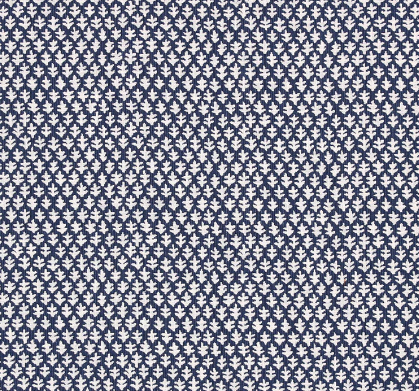 The Seabrook Outdoor Ottoman in Burma Indigo by Lee Industries features navy blue and white fabric with a small leaf pattern—an ideal, stylish choice for your patio or outdoor space.