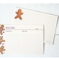 Two Gingerbread Partyware Collection recipe cards decorated with gingerbread men, serving as festive table accents with sections for ingredients, directions, and yield.