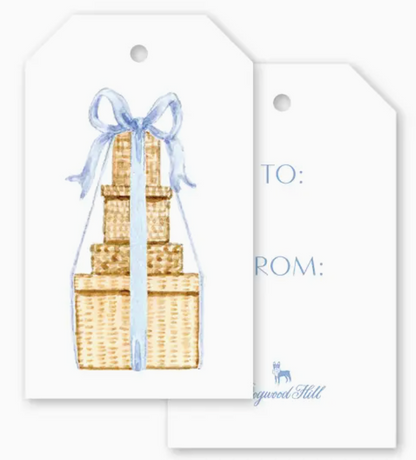 Two Isla Bahia Blue Gift Tags: one with a watercolor illustration of a stack of gifts tied with a blue ribbon, the other with printed “TO:” and “FROM:” lines.