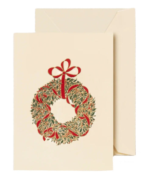 Introducing the Crane Classic Wreath Gift Enclosure Set—an elegantly engraved card that comes with an envelope and showcases a timeless wreath design with red ribbons on its cover.