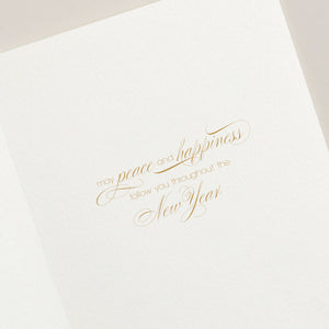 Send holiday wishes with the Candy Cane Lighthouse Card Set by Crane—an elegant addition to your Christmas cards, featuring a festive design and gold cursive text: "may peace and happiness follow you throughout the New Year.