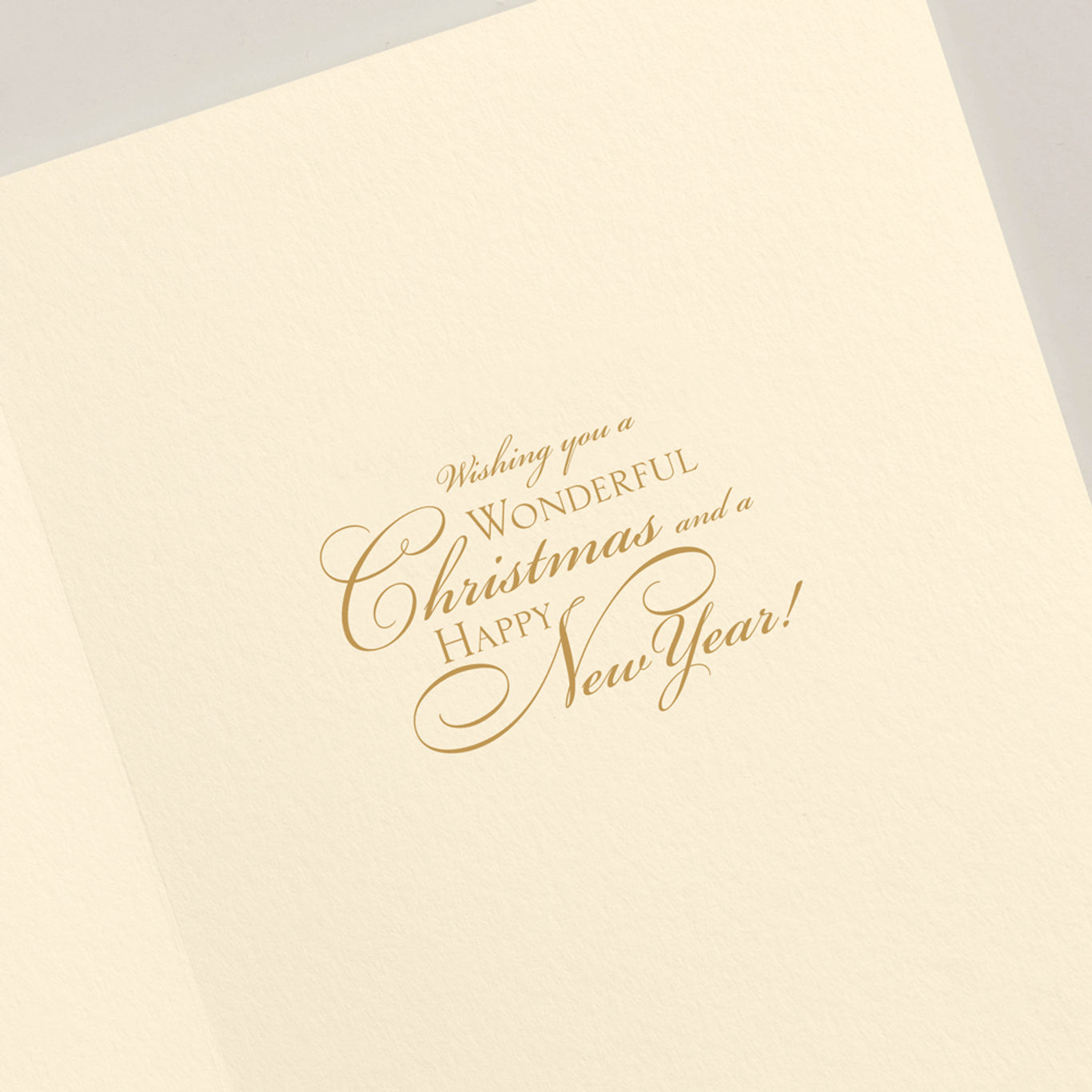 Introducing the Crane Regal Stocking Card Set by Crane: a cream-colored holiday card adorned with elegant gold text that reads, "Wishing you a Wonderful Christmas and a Happy New Year!" This card is perfectly designed for slipping into a stocking.