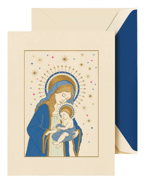 The Crane Mother And Child Card Set by Crane showcases an exquisite Christmas card featuring a detailed illustration of a woman in a blue cloak holding a child, surrounded by stars and a halo. Paired with a blue envelope, this card beautifully captures the holiday spirit with its artful engraving.