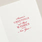 The Crane Snowflake Ornament Card Set features white holiday cards with red cursive and serif text, "Season’s greetings and best wishes for the New Year," accented by a delicate silver snowflake ornament for festive charm.