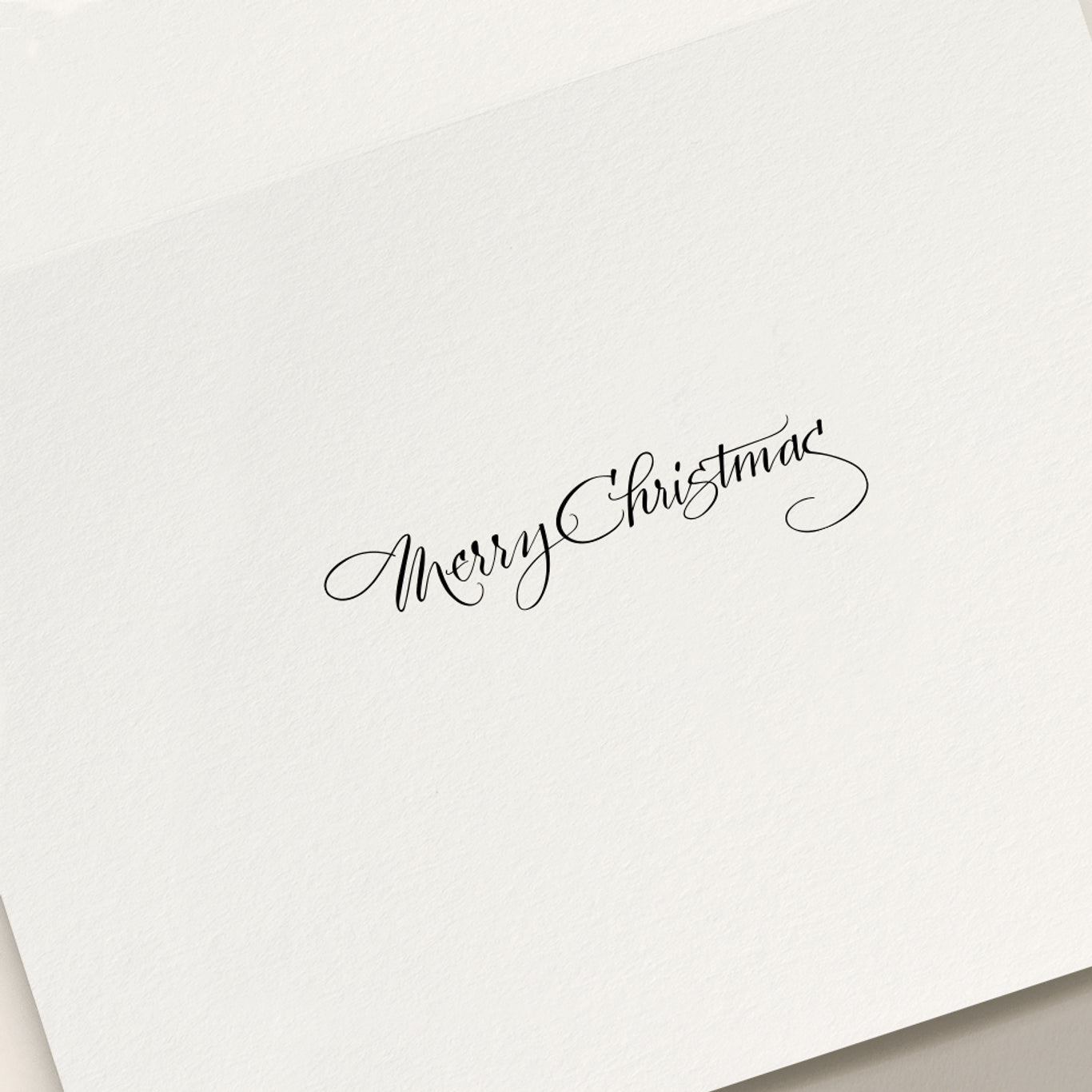 The Skating Noel Holiday Card Set by Crane features elegant black cursive "Merry Christmas" lettering on a white card, perfect for spreading festive cheer.