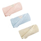 The Gooselings Cotton Knit Baby Blanket set features three rolled blankets in pastel pink, blue, and cream—each made from 100% cotton with a scalloped edge and sewn-in label, perfect for adding a cozy touch to the nursery.