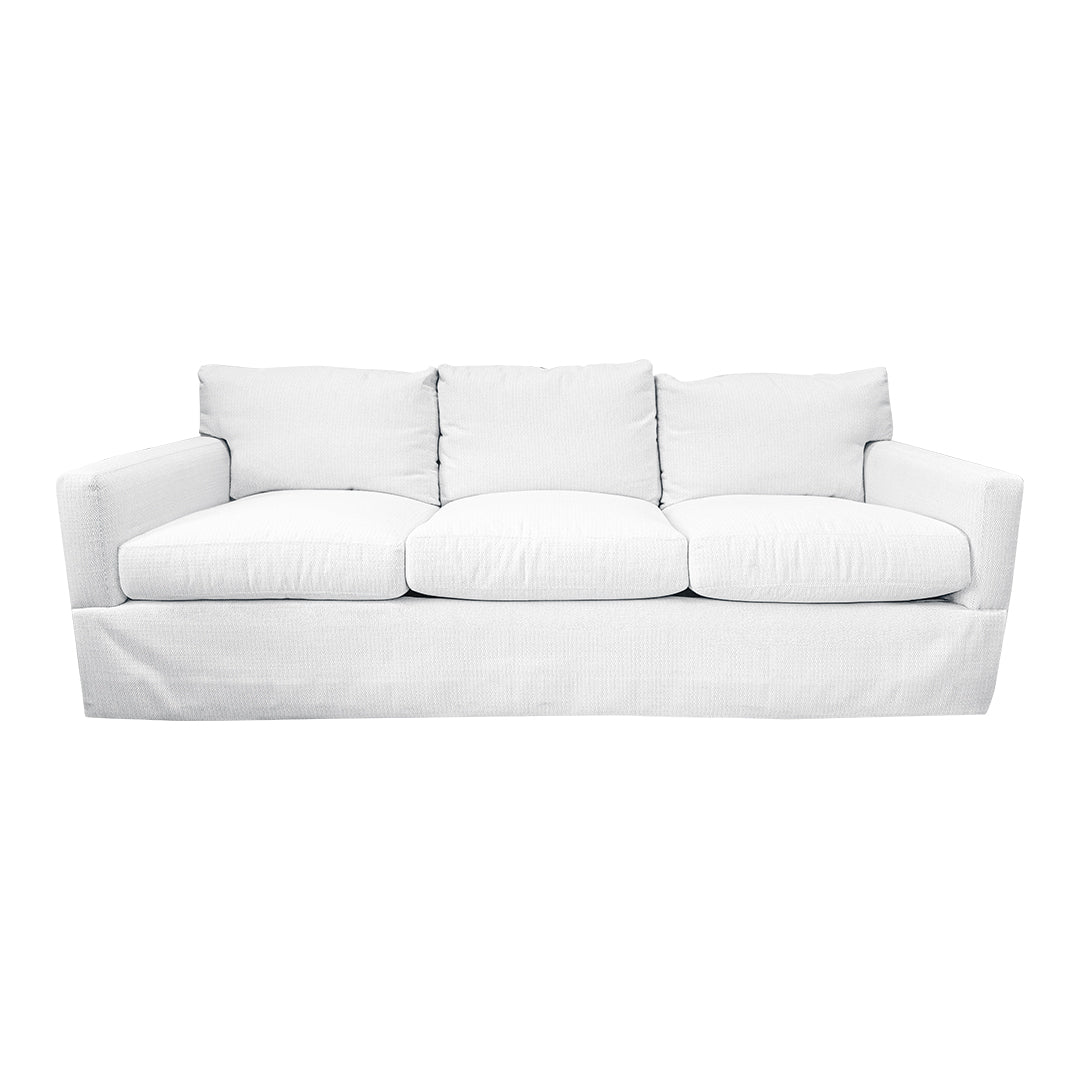 The Blair Sofa in Perennials Oyster Raffia by Lee Industries is a white, three-seater design with three seat cushions and three backrest pillows, featuring straight arms and a skirted base that blends modern style with transitional elegance, pictured against a plain white background.