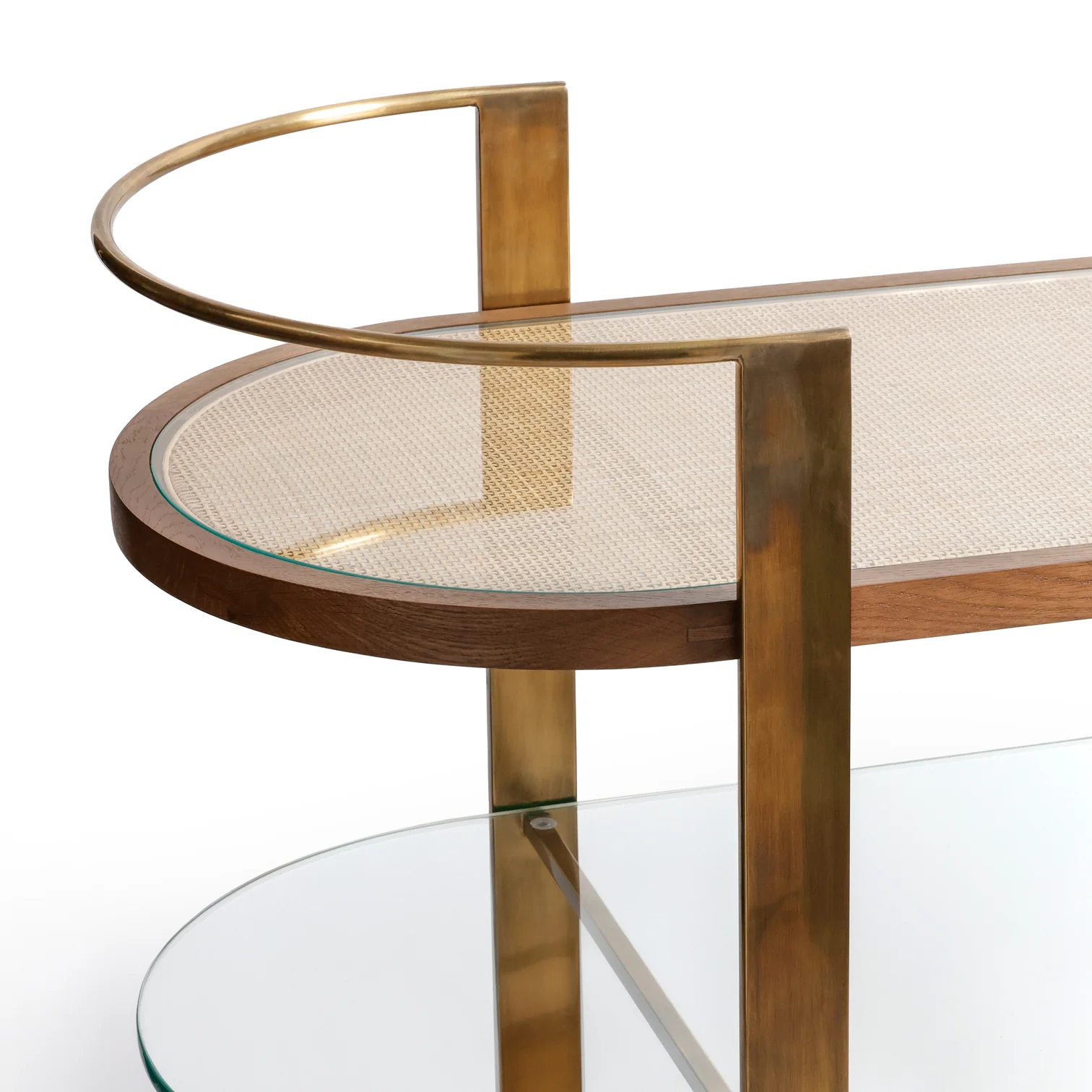 The Sloane Bar Cart by Zodax features a wooden frame, brass accents, two glass shelves, and chic cocktail accessories—an ideal addition to any home bar.