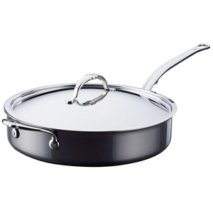 The Hestan NanoBond Titanium Sauté Pan, 5qt, with lid and long handle, offers ProCore Aluminum for even heating and is induction compatible; shown on a white background.
