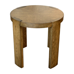 The Large Chairside Table in Wheat by Century Furniture features a round wooden top, four wide rectangular legs, and a smooth natural finish—perfect for stylish home decor.