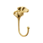 The Rejuvenation Cast Brass Dog Hooks feature a whimsical dog's head and neck design with a single curved gold brass hook, shown against a white background.