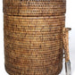 A cylindrical round Matahari Rattan Ice Bucket with Liner in Antique Brown Collection features a matching lid and a pair of metal tongs attached on the side, making it both stylish and practical.