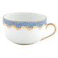 White ceramic teacup from the Herend Fish Scale Light Blue Collection by Herend, adorned with a gold and blue scalloped pattern along the rim, showcasing hand-painted designs on Herend porcelain, and featuring a gold-trimmed handle.