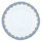Herend's Fish Scale Light Blue Collection features a white porcelain plate with a scalloped rim, blue and gold patterned border, and an intricate hand-painted design inspired by traditional Herend craftsmanship.