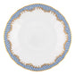 A white ceramic plate from the Herend Fish Scale Light Blue Collection, adorned with a blue and gold decorative rim pattern, perfect for those with an artistic appreciation.