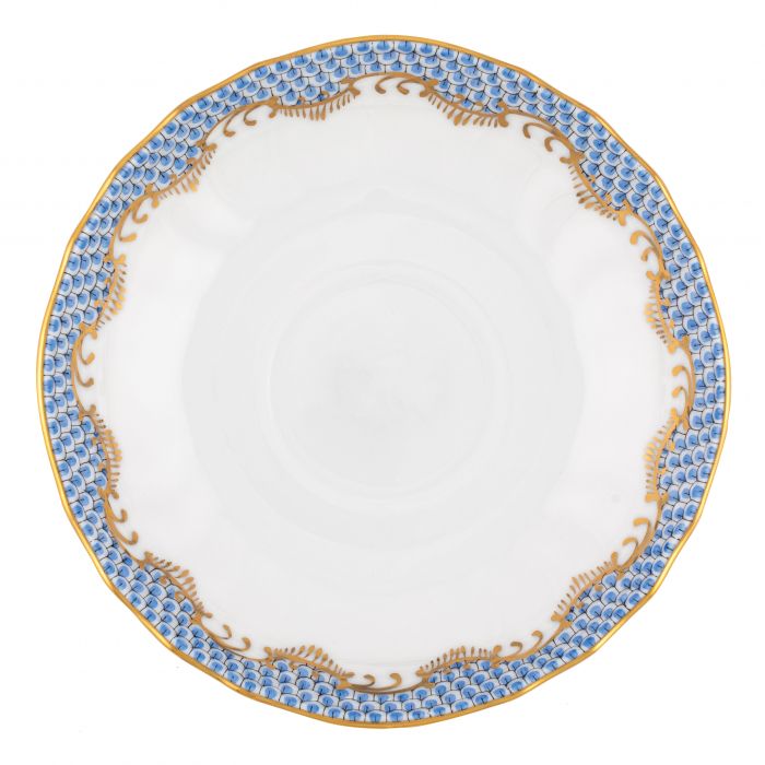 A white ceramic plate from the Herend Fish Scale Light Blue Collection, adorned with a blue and gold decorative rim pattern, perfect for those with an artistic appreciation.