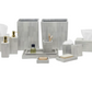 The Arles Bath Collection by Pigeon & Poodle features sleek, gray marble-patterned accessories—tissue box, soap dispenser, tray, and container—arranged on a white background. Inspired by classic faux horn bath sets.